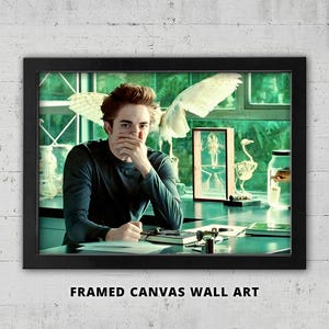 May include: Framed canvas wall art featuring a person in a dark long-sleeve shirt, seated at a table. The background includes scientific displays and a large window. The text "FRAMED CANVAS WALL ART" is at the bottom.