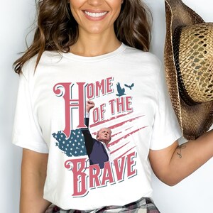 Patriotic &quot;Home of the Brave&quot; Donald Trump Graphic Tee, USA Flag Shirt, Trump 2024 Shirt, Women for Trump, Unisex Jersey Short Sleeve Tee