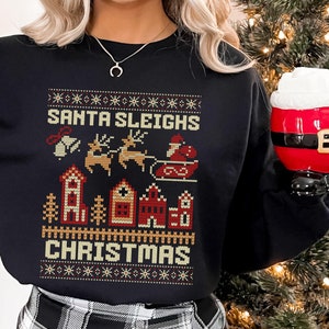 Santa Sleighs Christmas Ugly Sweater | Retro Pixelated Christmas Sweater | Funny Holiday Sweater Unisex Heavy Blend™ Crewneck Sweatshirt