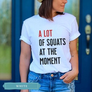 A Lot of Squats at the Moment Fitness Tee , Funny Gym Shirt for Workouts, Gym Girl Funny Shirt Bella and Canvas Short Sleeve White Tee