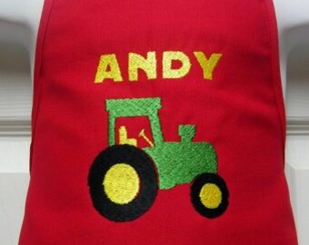 Delantal infantil personalizado con bordado de tractor agrícola - 14 colores divertidos