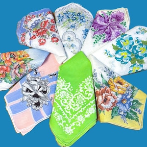 May include: A collection of vintage handkerchiefs with floral and graphic designs. The handkerchiefs feature a variety of colors, including red, blue, yellow, and green. Some handkerchiefs have intricate floral patterns, while others have skull and bow designs.