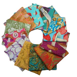 May include: A circular arrangement of folded fabric squares featuring various mushroom and floral patterns. The fabrics display a range of colors, including red, blue, green, purple, and yellow. The designs include detailed illustrations of mushrooms and botanical elements.