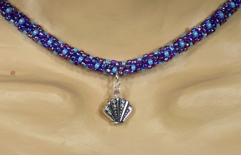 Purple and blue polka dot shell necklace