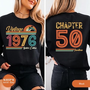 May include: A black long-sleeve sweatshirt featuring a front graphic with a sunset, palm trees, and the text Vintage 1976 Limited Edition. The back displays the text CHAPTER 50 with the name Jonathan in orange, yellow, and teal retro colors.