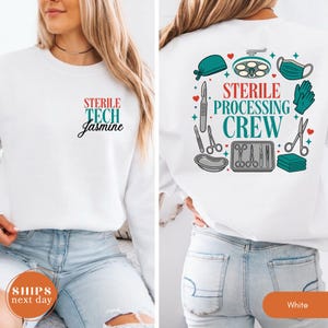 May include: A white long-sleeve sweatshirt featuring a small chest graphic that reads STERILE TECH Jasmine. The back displays a large graphic with the text STERILE PROCESSING CREW surrounded by illustrations of surgical tools, gloves, and a mask.
