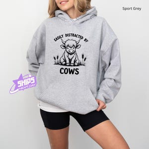 Easily Distracted by Cows Sweatshirt, Humorous Cow Lover Hoodie, Farm Animal Graphic Sweater, Funny Cow Pullover, Gift for Cow Lovers