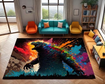 May include: A colorful rug with a black silhouette of a monster with a splatter paint design. The rug has a dark background with splashes of red, orange, yellow, green, blue, and purple.