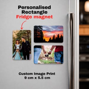 May include: Three rectangular fridge magnets measuring 9 cm x 5.5 cm, featuring custom photo prints. One shows a couple in formal attire, another a sunset forest landscape, and the third a person holding an ultrasound image. Text reads: Personalised Rectangle Fridge magnet.