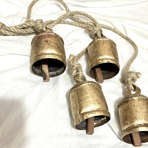Christmas  Cow bells /4 hanging set of bells / vintage decorative hanging bell / Rustic cow bells cluster on rope wall hanging