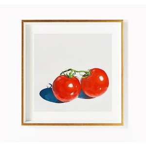 May include: A framed painting of two red tomatoes on a vine, with a blue shadow cast on a white background.