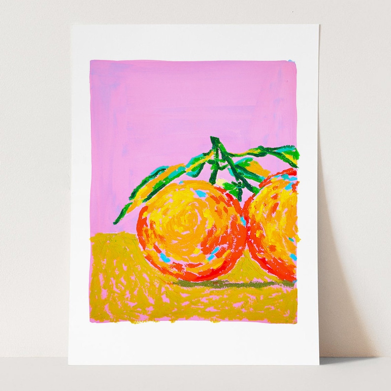 May include: Two bright orange oranges with green leaves on a pink background. The oranges are painted in a stylised way with orange, yellow, and red hues.