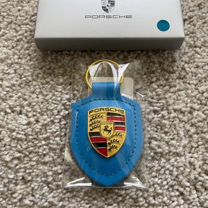 Chaveiro de couro original PORSCHE Crest, corrente, azul, WAP0500920E