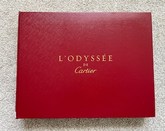 L’Odyssée de Cartier Red Hardcover Book, Luxury Maison Archive Display