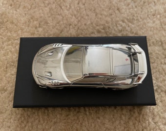 718 ケイマン GT4 RS 1:43 ペーパーウェイト アルミクロームモデル