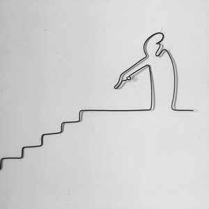 The line Osvaldo Cavandoli wire art, wall phrase, sculpture, staircase going up and down