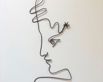 Sculptuur van gegloeid draad Gezichtsprofiel geïnspireerd door Cocteau