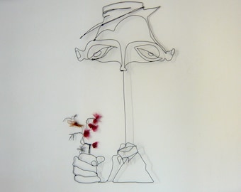 Man with a bouquet of flowers - Buster Keaton - wire sculpture - wire art - wall decoration