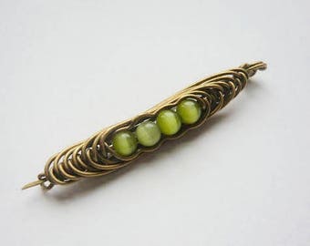 Sissi pea brooch, steel strand