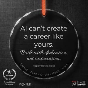 May include: A clear crystal glass ornament with a faceted edge, featuring the text "Al can't create a career like yours." and "Built with dedication, not automation." Includes "Happy Retirement" and names. An orange ribbon is attached.