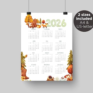 May include: A 2026 calendar print with watercolor illustrations of forest animals and trees. The calendar includes the text "2 sizes included A4 & US-letter". The calendar is white with a monthly layout.