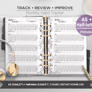 May include: A monthly habit tracker planner insert with black and white printed grids, floral vine illustrations, and a gold six-ring binder mechanism. The text reads TRACK • REVIEW • IMPROVE, Monthly Habit Tracker, and A5 + Half-letter Printable.
