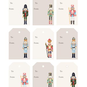 May include: Nine gift tags with watercolor illustrations of nutcracker soldiers in various uniforms. Each tag has space for "To:" and "From:" text. The nutcrackers are in shades of red, green, blue, and gold.