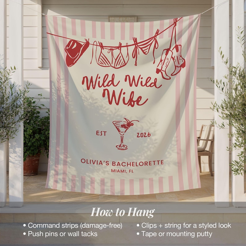 Puede incluir: Una pancarta color crema con rayas rosas y texto rojo que dice "Wild Wild Wife" con un gr&aacute;fico de copa de c&oacute;ctel. La pancarta tambi&eacute;n incluye "Olivia's Bachelorette, Miami, FL" y el a&ntilde;o "2026".