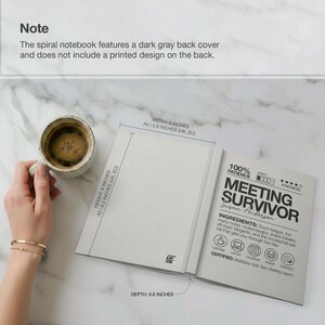 May include: Open spiral notebook with the text "MEETING SURVIVOR" and the author's name, Susan Anderson. The notebook is 8 inches high, 6 inches wide, and 0.6 inches deep. A cup of coffee sits next to the notebook.