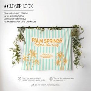 May include: A beach towel with a light blue and white striped background. The towel has the words "PALM SPRINGS before the ring" in orange, along with palm tree illustrations. The text "Olivia's BACHELORETTE WEEKEND" is also on the towel.