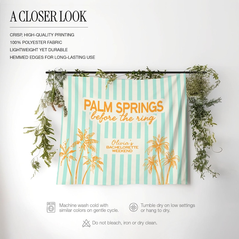May include: A beach towel with a light blue and white striped background. The towel has the words "PALM SPRINGS before the ring" in orange, along with palm tree illustrations. The text "Olivia's BACHELORETTE WEEKEND" is also on the towel.
