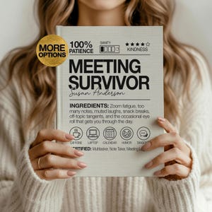 May include: A light-colored notebook titled "MEETING SURVIVOR" with the name "Susan Anderson" printed below. The notebook lists "INGREDIENTS" such as Zoom fatigue and snack breaks. A gold-colored circle with the words "MORE OPTIONS" is in the upper left corner.