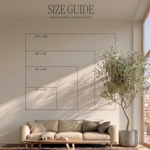 May include: A wall art size guide with the text "SIZE GUIDE HORIZONTAL ORIENTATION". The guide shows four rectangular outlines with dimensions: 104" x 88", 80" x 68", 60" x 50", and 36" x 26". A sofa and a tree are in the foreground.