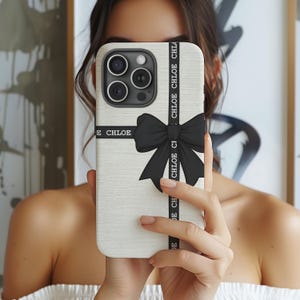 Schwarze Schleife Personalisierte Telefon Hülle für iPhone 16 15 14 13, Benutzerdefinierte Name Telefon Fall für Samsung S23, Kokette Phonecase, kundenspezifische iPhone Fall Bild 1