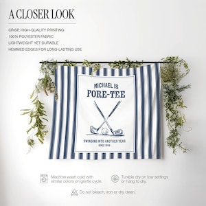 May include: A white and navy blue striped golf-themed wall hanging. The center features the text "MICHAEL IS FORE-TEE" with crossed golf clubs and a golf ball. The text "SWINGING INTO ANOTHER YEAR SINCE 1986" is also present.