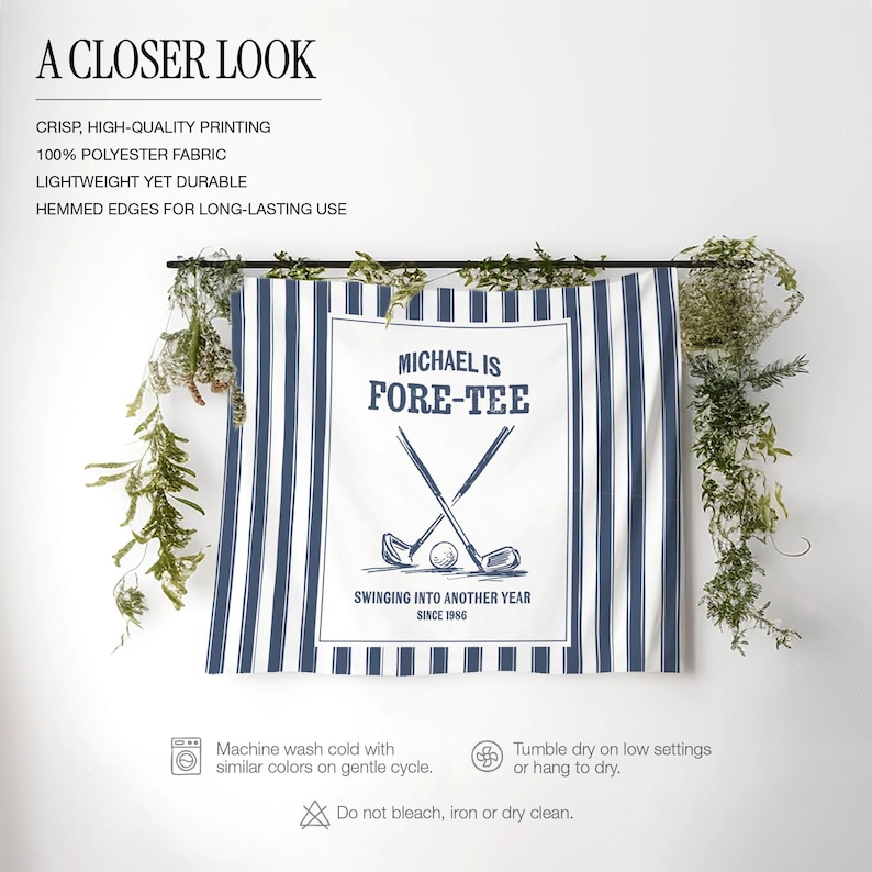 May include: A white and navy blue striped golf-themed wall hanging. The center features the text "MICHAEL IS FORE-TEE" with crossed golf clubs and a golf ball. The text "SWINGING INTO ANOTHER YEAR SINCE 1986" is also present.