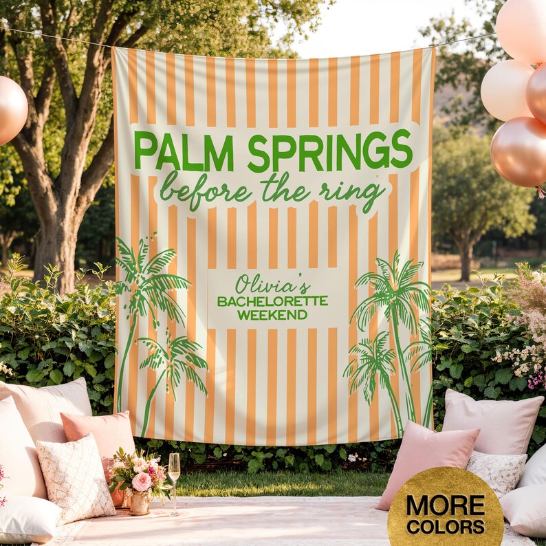 May include: A large, striped backdrop with the text "PALM SPRINGS before the ring" in green. The backdrop also features palm tree illustrations and the text "Olivia's BACHELORETTE WEEKEND". The backdrop is orange and white.