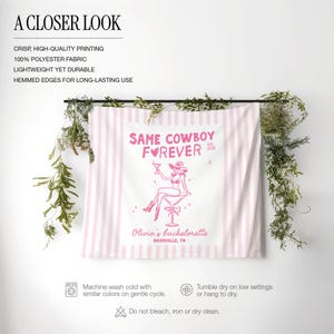 以下が含まれることがあります： ピンクと白のストライプ柄の布製バナーで、「SAME COWBOY FOREVER」の文字とカウボーイハットをかぶった女性のグラフィックが描かれています。バナーには「Olivia's bachelorette, Nashville, TN」の文字も含まれています。