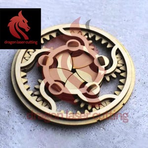 Juguete mecánico cortado con láser con rompecabezas de engranajes Paquete SVG Glowforge Archivos SVG de iris de madera Archivo de plantilla láser vectorial DXF Pdf Eps Patrón CNC