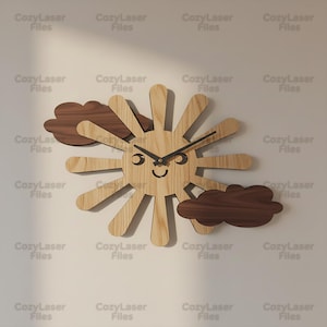 May include: Wooden sun-shaped wall clock with a smiling face, black clock hands, and two dark brown cloud accents. The clock is made of light-colored wood and features the text "CozyLaser Files".