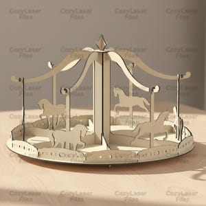 May include: A wooden carousel model with six horse figures, a decorative roof, and the text "Cozy Laser Files" repeated around the image. The carousel is made of light-colored wood and has a detailed design.