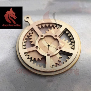 Juguete mecánico cortado con láser con rompecabezas de engranajes Paquete SVG Glowforge Archivos SVG de iris de madera Archivo de plantilla láser vectorial DXF Pdf Eps Patrón CNC