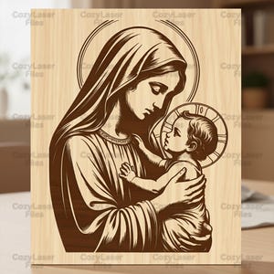 May include: Wooden plaque featuring a detailed engraving of Mary holding baby Jesus, both with halos. The artwork is in a dark brown color, set against a light wood grain background. The text "Cozy Laser Files" is repeated around the edges.
