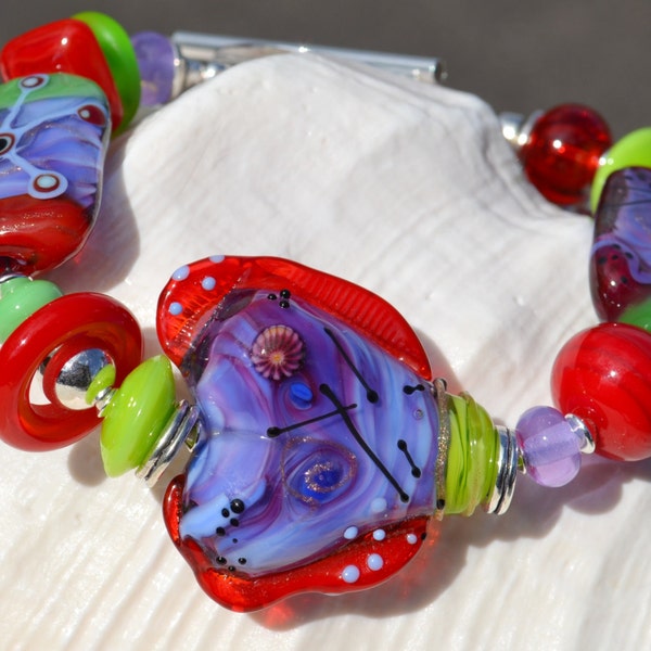 Reserve for Suzanne-SHAKE IT UP-Handmade Lampwork and Sterling Silver Bracelet