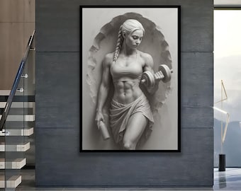 May include: Monochrome framed artwork depicting a muscular person lifting a dumbbell. The person wears a sports bra and skirt, holding a water bottle. The artwork is set against a textured background.