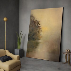 May include: A large abstract painting depicting a misty landscape with a single tree silhouetted against a golden sky. The painting is done in muted tones of brown, green, and gold.
