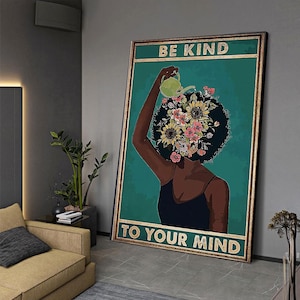 May include: A vintage-style poster with a teal background featuring a woman with a crown of flowers on her head. The text on the poster reads "Be Kind To Your Mind".