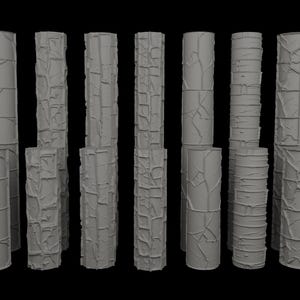May include: A selection of grey, cylindrical decorative columns with diverse textured designs. Some columns feature cracked, stone-like patterns, while others have vine-like textures or floral motifs. The columns vary in height and diameter.