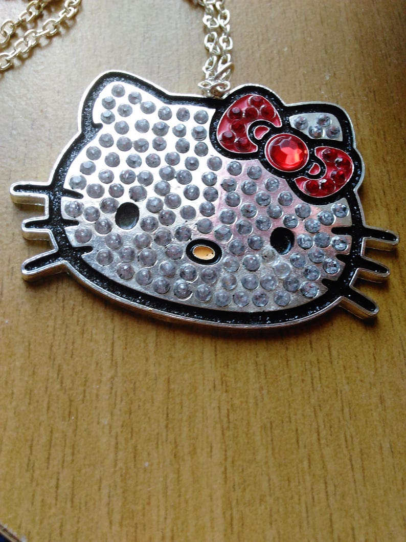 Vintage Sanrio 1976 Hello Kitty Pendant Necklace Red Bow Image 0