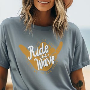 Graphic Tee Ride the Wave Surfer Shirt, Beach & Ocean Lover Gift, Summer Surfing Tee, Coastal Vibes Hawaiian T-Shirt